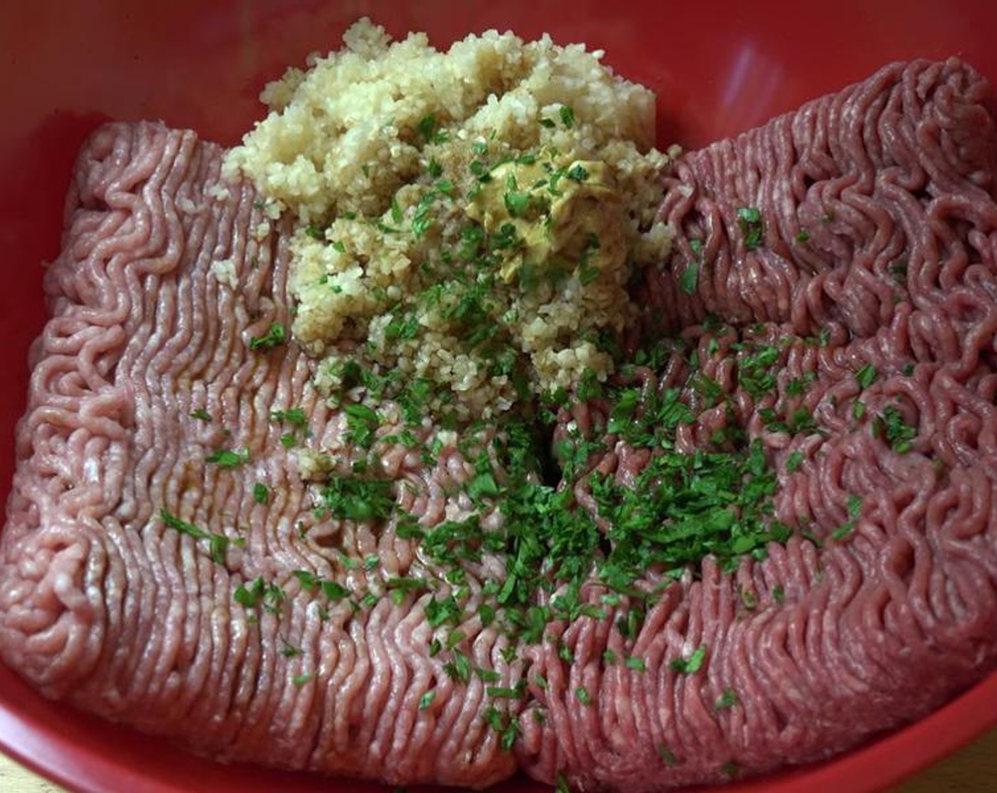 step 1 Using clean hands, mix Ground Pork (1.1 lb), Ground Beef (1.1 lb), Yellow Onion (1), Garlic (1 clove), Dijon Mustard (1 tsp), Worcestershire Sauce (1 Tbsp), and Fresh Parsley (2 Tbsp) in a large bowl.