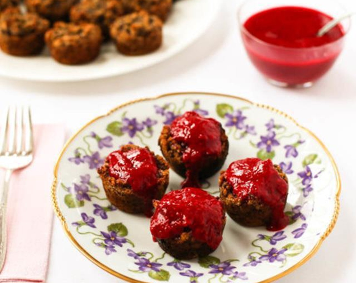 Cranapple Banana Muffins with Raspberry Topping