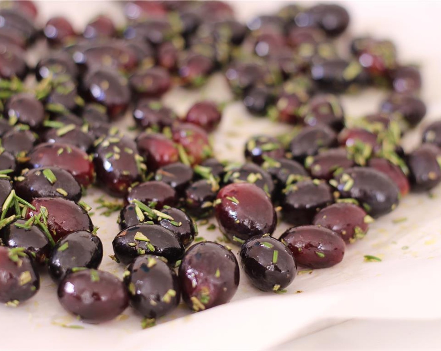 step 7 Toss the Grapes (1 bunch), Olive Oil (1 Tbsp), Salt (to taste), and the rosemary. Place them on a cookie sheet, and roast for 30-45 minutes.