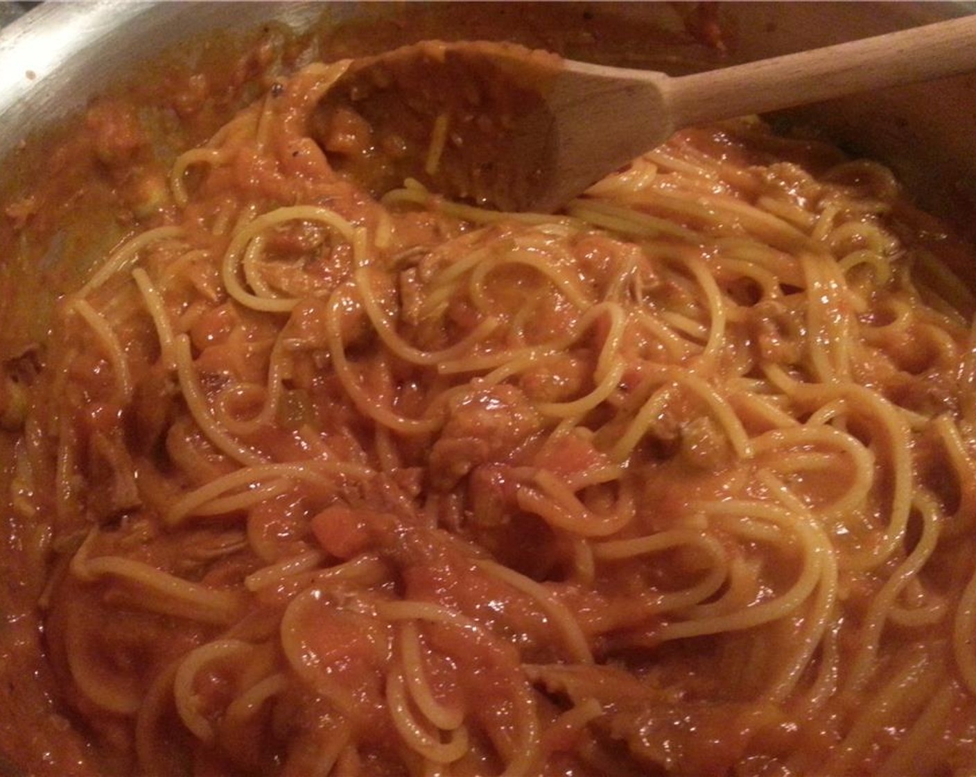 step 18 Add the shredded pork to the tomato gravy, along with the cooked pasta. Stir to combine. Give everything a taste, and season with Salt (to taste), Ground Black Pepper (to taste) and Sriracha (to taste) for more heat.