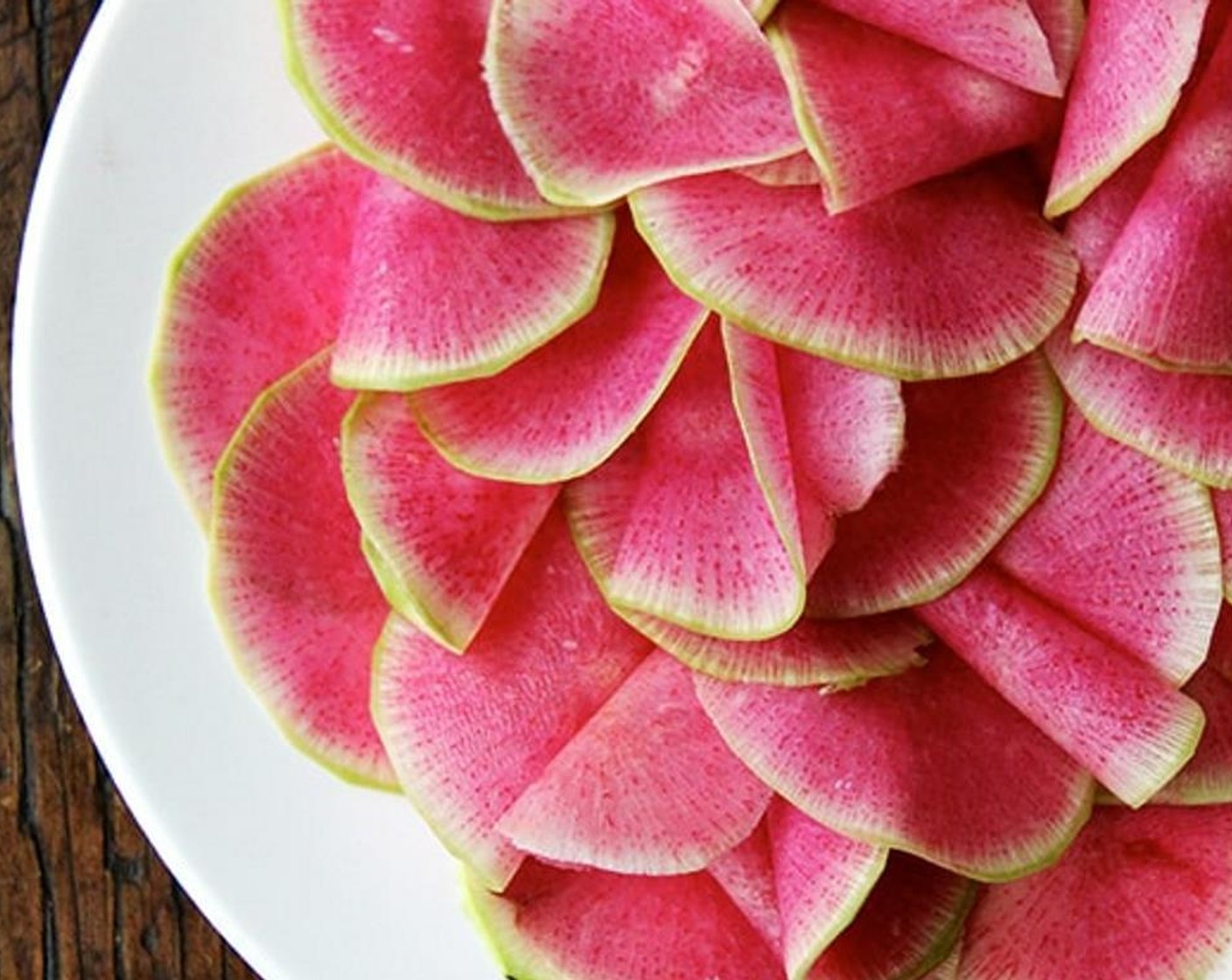 step 3 Arrange radish slices on a platter. I try to fold some of them so they're not all squished down in one flat layer, but arrange however you wish. Season all over with Kosher Salt (to taste)