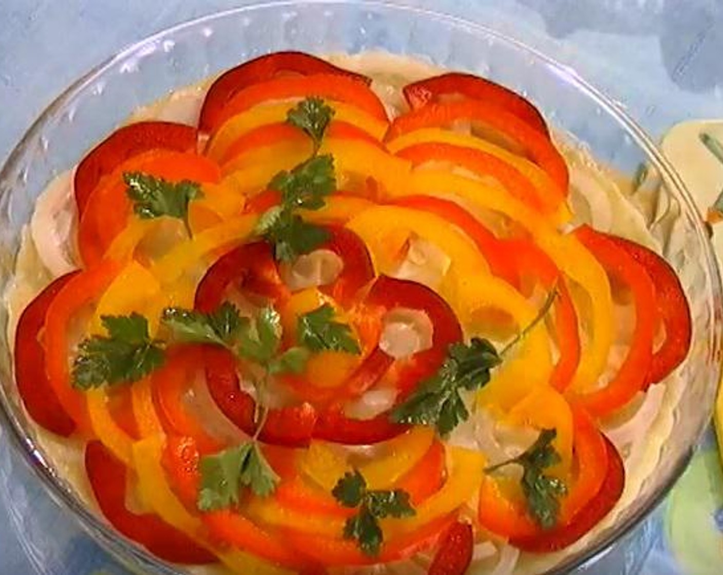 step 2 Spread some Mayonnaise (to taste) over the flattened dough. Place the sliced Bell Peppers (2), and sliced Onion (1) over the dough. Spread Fresh Parsley (to taste), Fresh Dill (to taste) and season with Salt (to taste) and Ground Black Pepper (to taste).