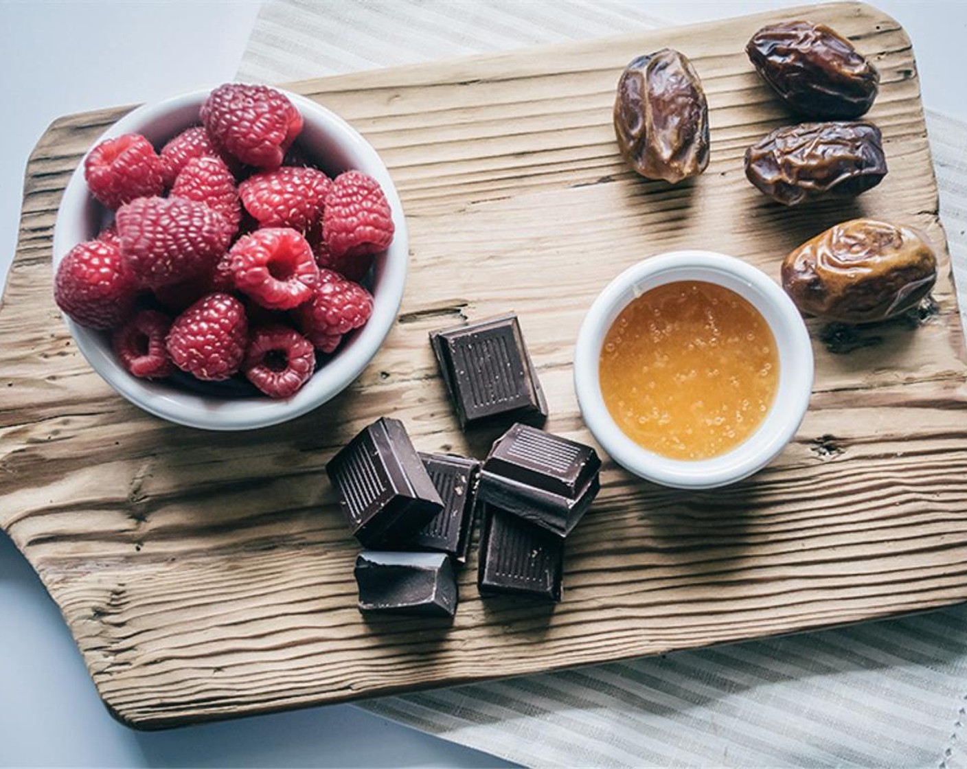 step 2 Once chocolate and butter are melted, add in the Honey (1 Tbsp), Unsweetened Cocoa Powder (2 Tbsp) and the remaining Organic Butter (1 Tbsp). Continue stirring to incorporate and ensure chocolate does not burn.