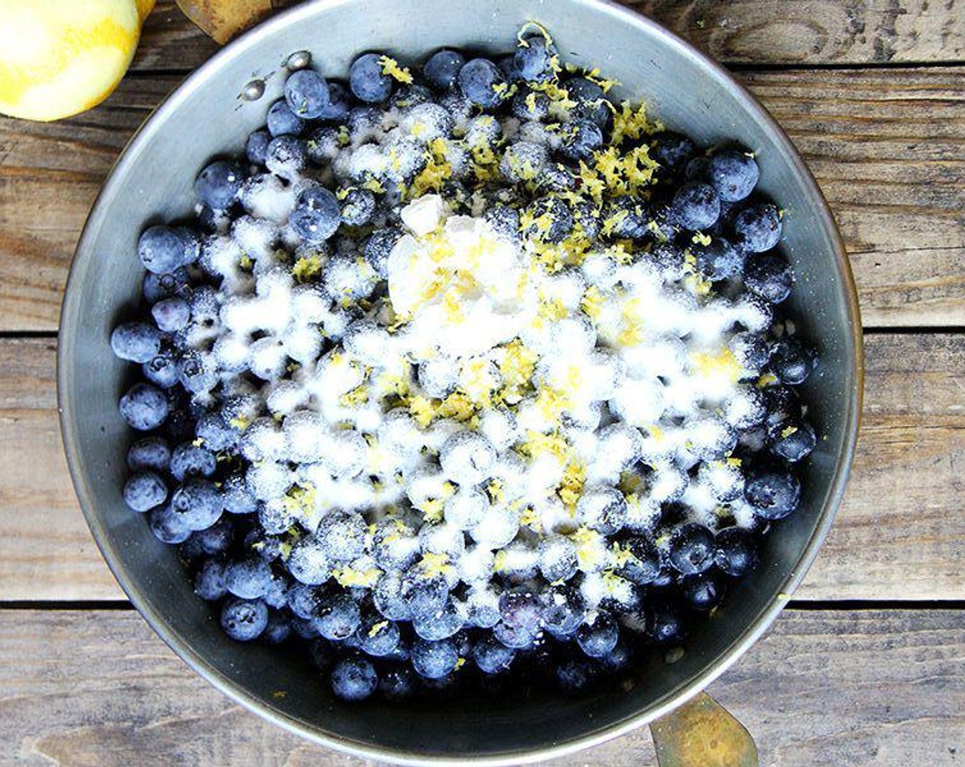 step 2 For the filling: Stir the Granulated Sugar (1/2 cup), Corn Starch (1 Tbsp) and Salt (1 pinch) together in a large bowl. Add the Fresh Blueberries (6 cups) and mix gently with a rubber spatula until evenly coated; add the zest of the Lemon (1) plus the juice from 1/2, and mix to combine.