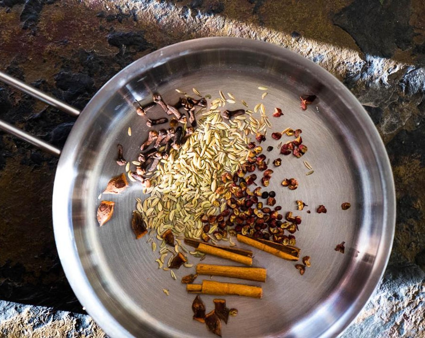 step 1 Add Fennel Seeds (1 tsp), Sichuan Peppercorns (1 tsp), broke apart Cinnamon Stick (1 in), Whole Clove (1 tsp), Star Anise (1) into a small pan. Roast over medium heat until fragrance is released.
