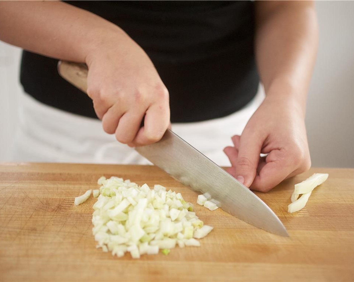 step 4 Peel the Onion (1/2). Cut the onion and Red Bell Pepper (1/2) into quarter inch diced pieces. Add to the bowl with the garlic.