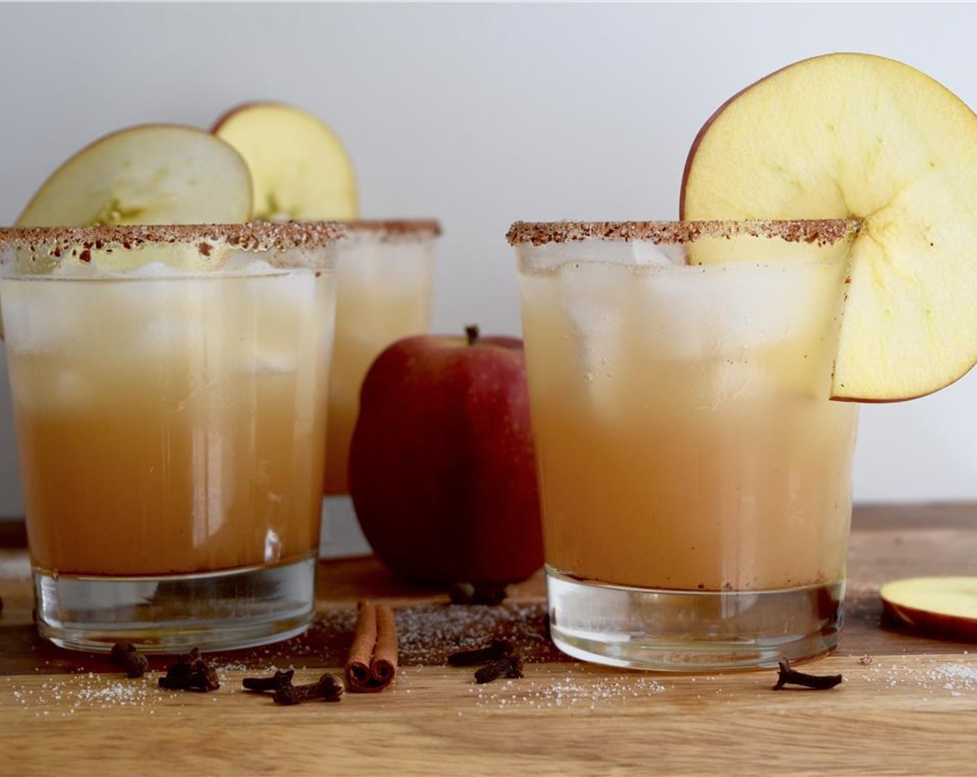 step 5 Add Ice (to taste) to the glasses, divide the margaritas between them, and garnish with apple slices. Serve and enjoy!