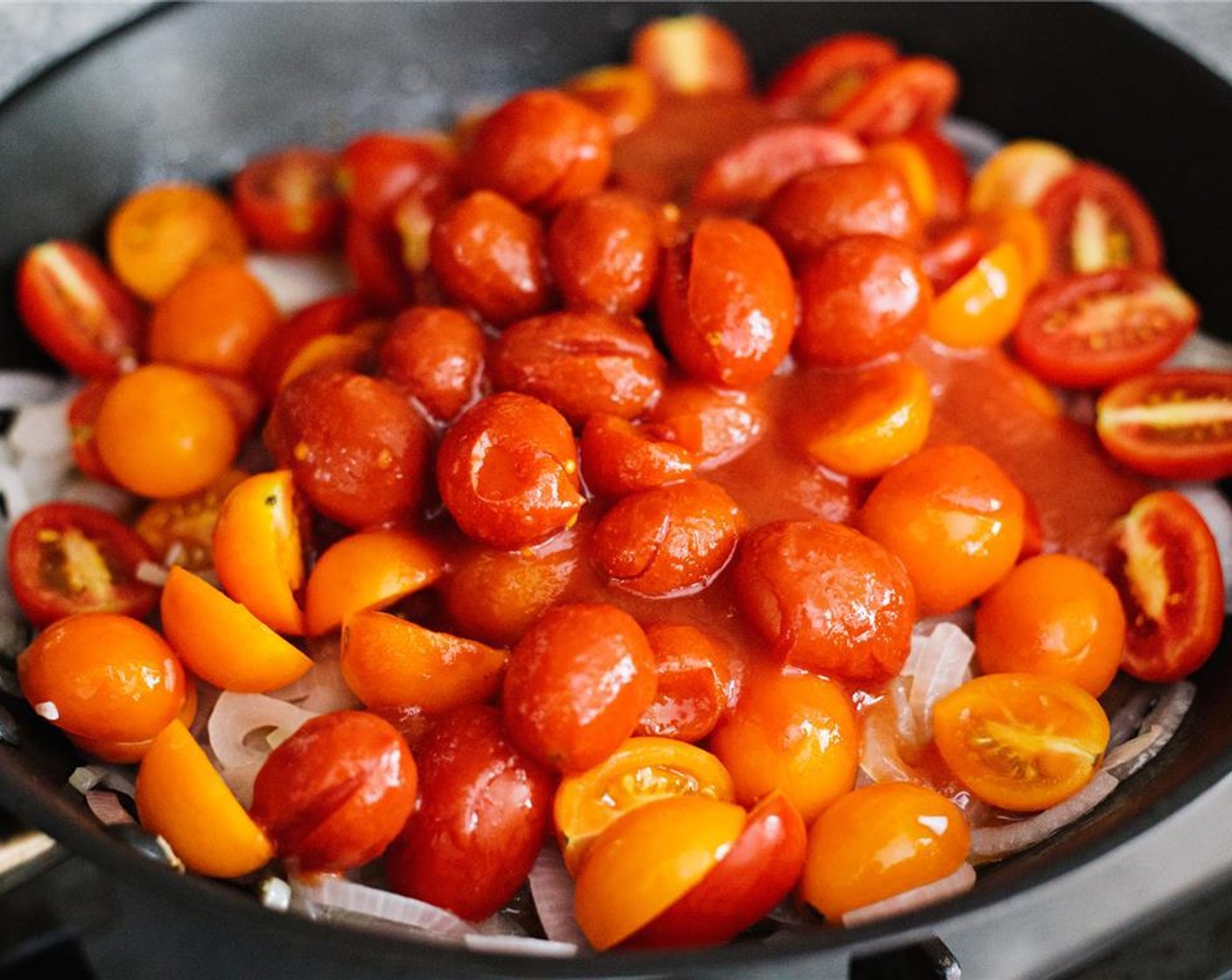 step 9 Add assorted cherry tomatoes and the Canned Cherry Tomatoes (1 can).