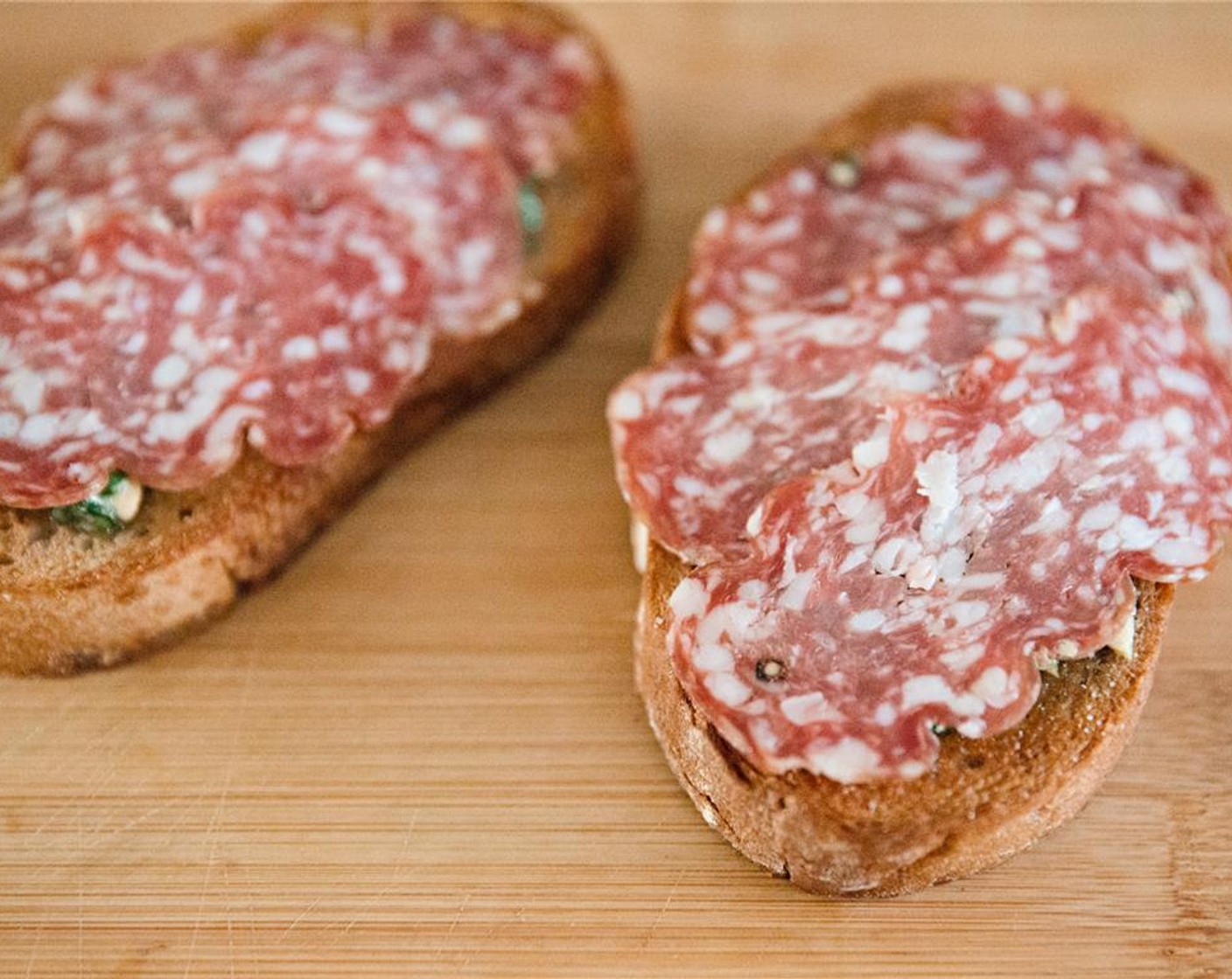 step 11 Add sliced Toscano Salami (24 slices).