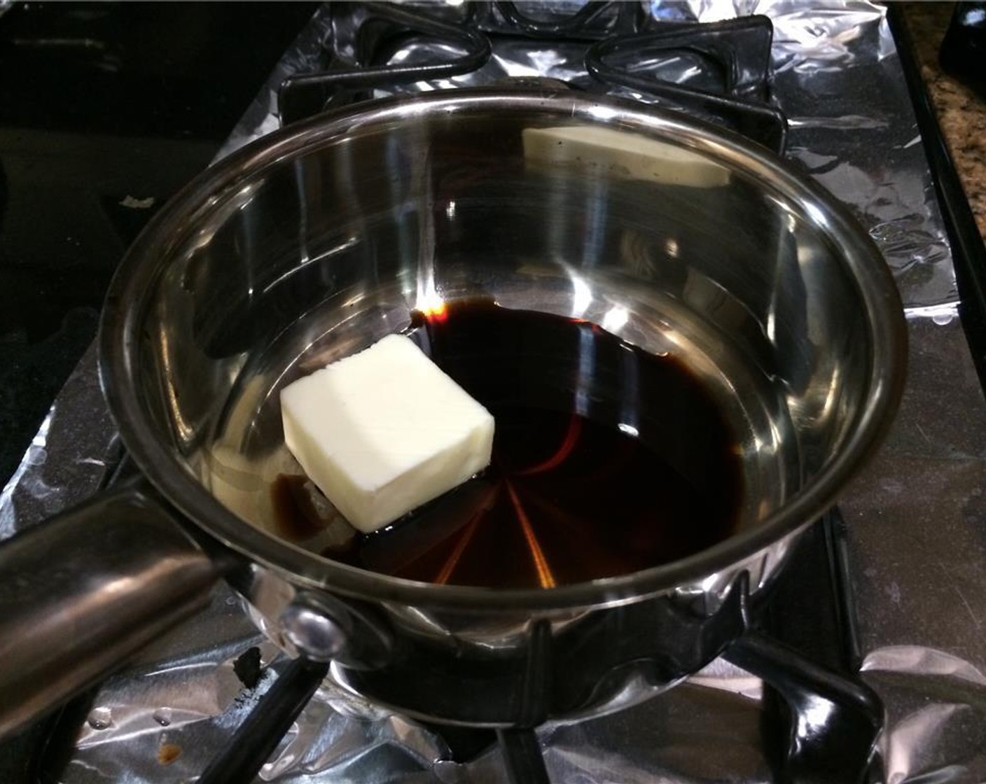 step 3 Melt Butter (2 Tbsp) in a pan with Balsamic Vinegar (1 tsp) and Soy Sauce (1 Tbsp) over low heat. Set aside.