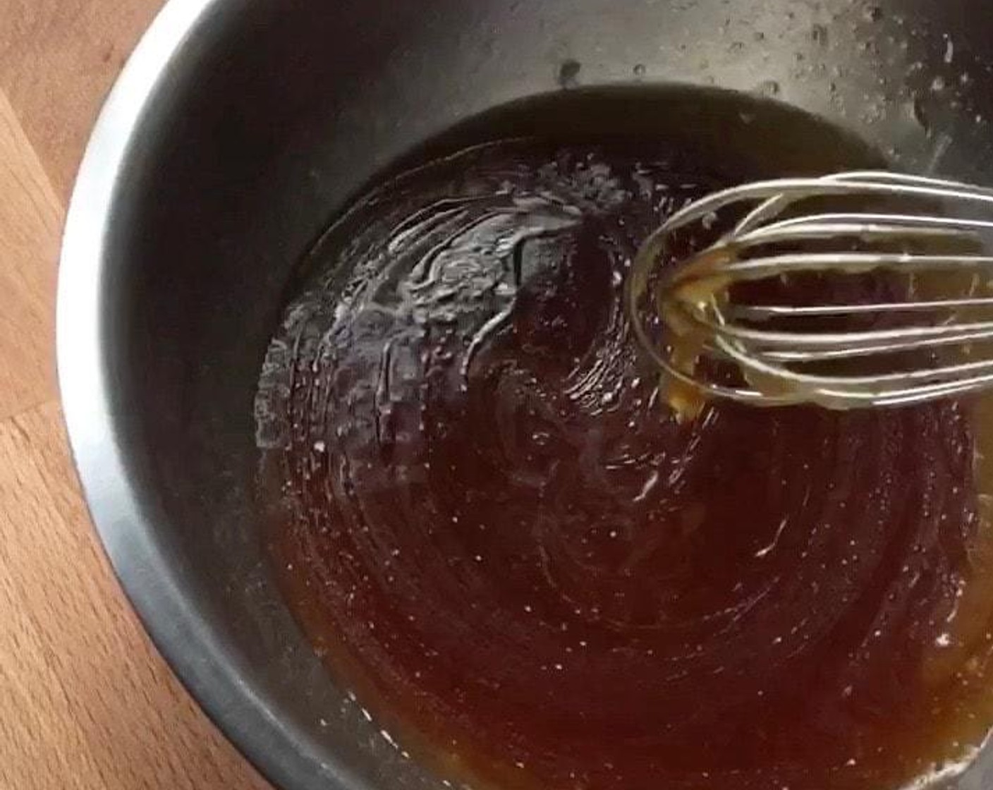 step 2 Pour Golden Syrup (13 oz) in a bowl. Add in Peanut Oil (5.5 oz), Alkaline Water (1 tsp) and All-Purpose Flour (1 Tbsp). Stir to mix well.