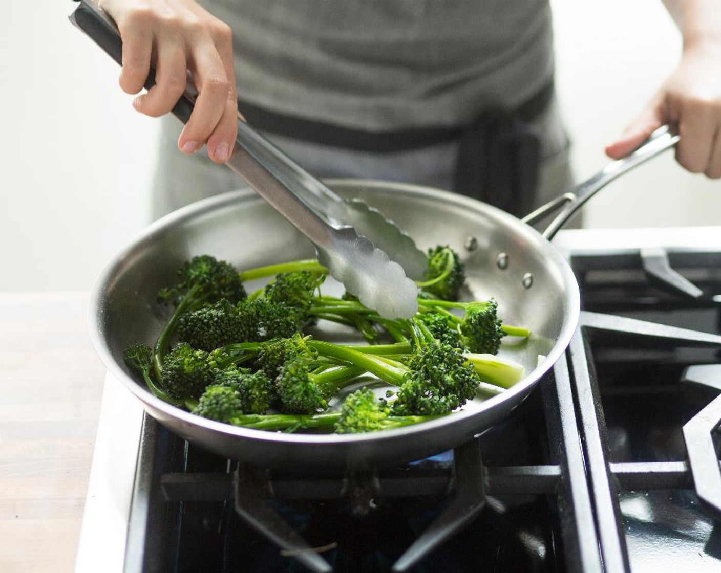 step 10 Place the broccolini, Salt (1/4 tsp) and Ground Black Pepper (1/4 tsp) and cook for 4 to 5 minutes. Remove from heat and keep warm for plating.