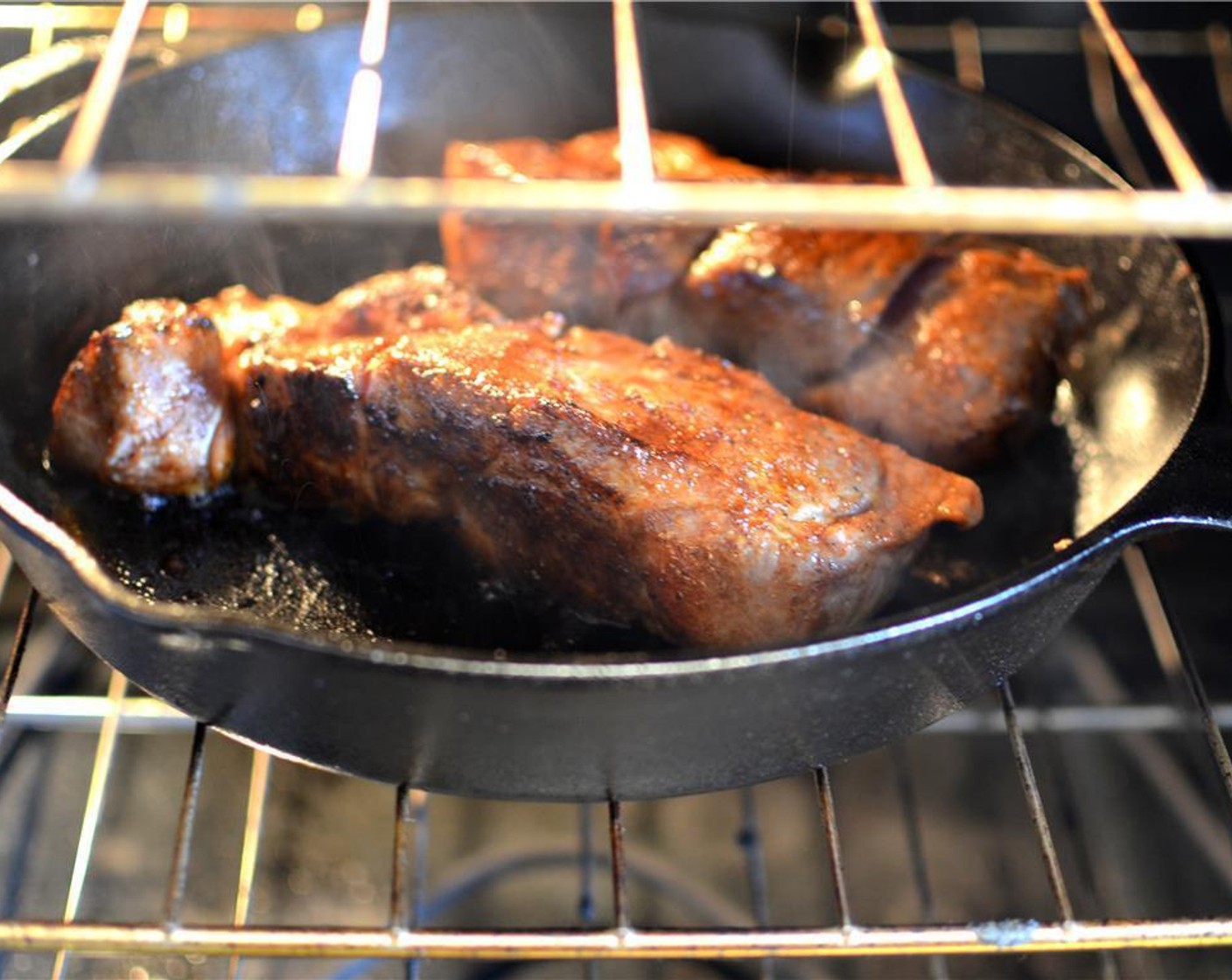 step 6 Then put the pan (or transfer to a baking sheet if it's not oven proof) in the preheated oven for 25-30 mins. Turn the pork over about halfway through the cooking time.