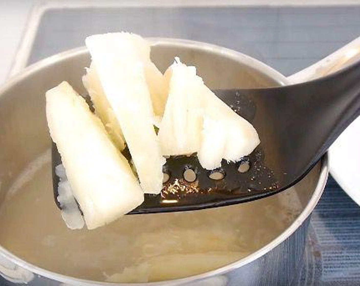 step 3 Once the cassava is cooked remove from the water and leave to dry out.