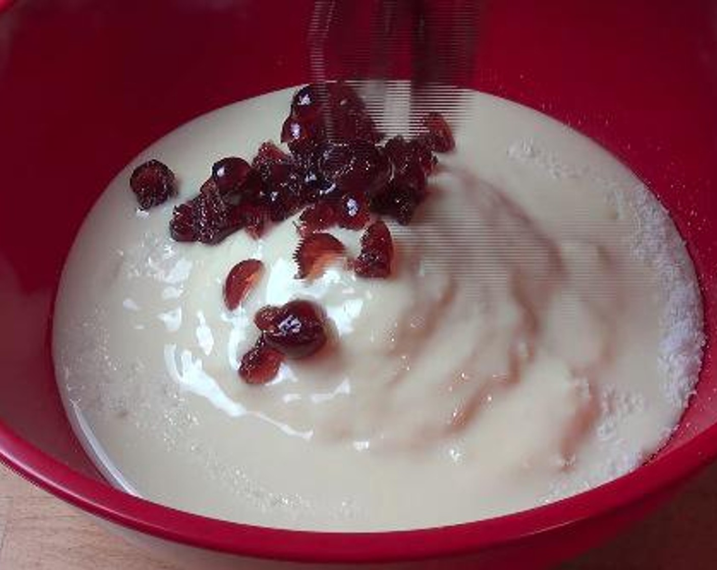 step 3 Add Unsweetened Shredded Coconut (4 cups), Sweetened Condensed Milk (1 1/3 cups), Glace Cherry (1 cup) cut into quarters and White Chocolate (3/4 cup). Add a couple of drops of Pink Food Coloring (to taste) and mix well.