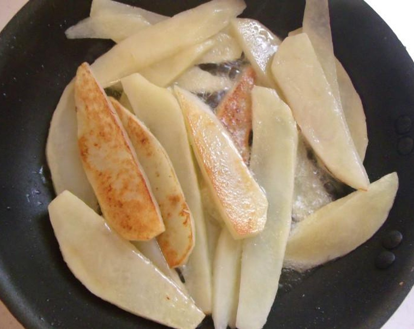 step 4 Let potatoes dry a few minutes, cut into slices and season potatoes with Kosher Salt (to taste) and Ground Black Pepper (to taste), saute in Duck Fat (to taste) until golden and crisp.