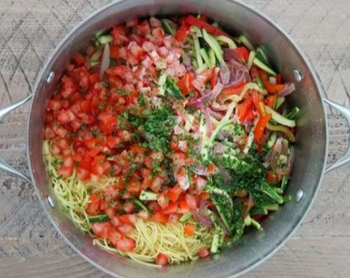 step 16 Add the vegetables and the sauce along with the Tomato (1) and Fresh Herbs (1 Tbsp) to the cooked pasta and mix to combine. If you need to thin it out more, add some of the reserved pasta water.