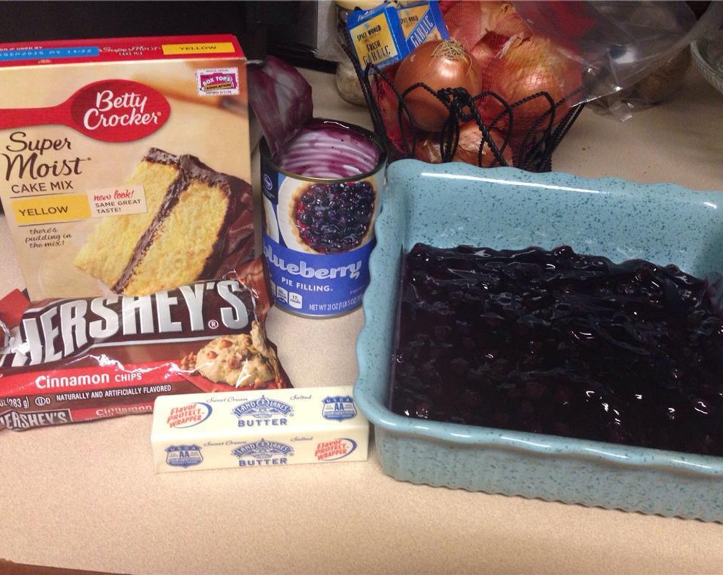 step 2 Spread Blueberry Pie Filling (2 1/4 cups) on the bottom of a baking dish.