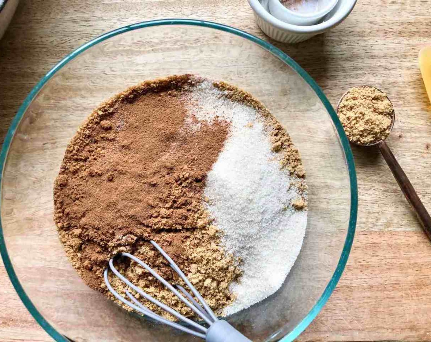 step 3 To make the Graham Cracker Crust, combine the remaining crumbs, Granulated Sugar (2 Tbsp), Ground Cinnamon (1 tsp), and Salt (1/8 tsp) in a bowl, stirring well. Stir in 2 Tbsp of Farmhouse Eggs® Large Brown Egg (1) and Butter (2 Tbsp).