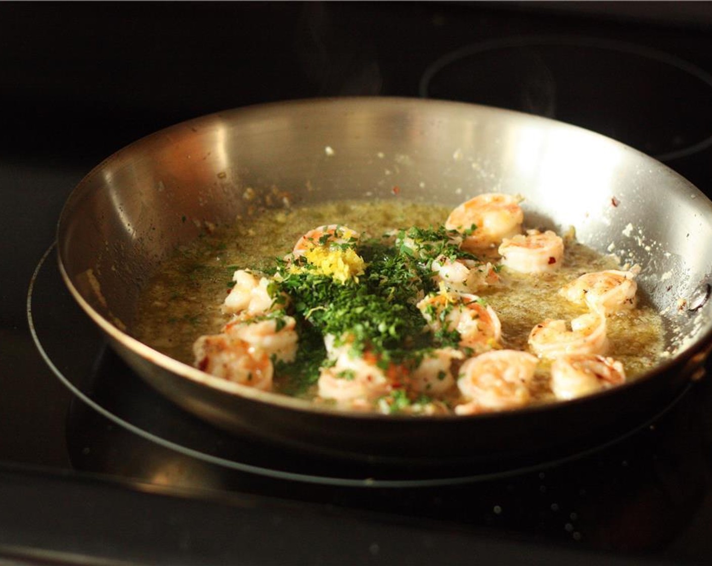 step 5 Remove the frying pan from the heat and add the Lemon (1) zest and juice, and Italian Flat-Leaf Parsley (3 Tbsp). Toss well and adjust seasoning to taste.