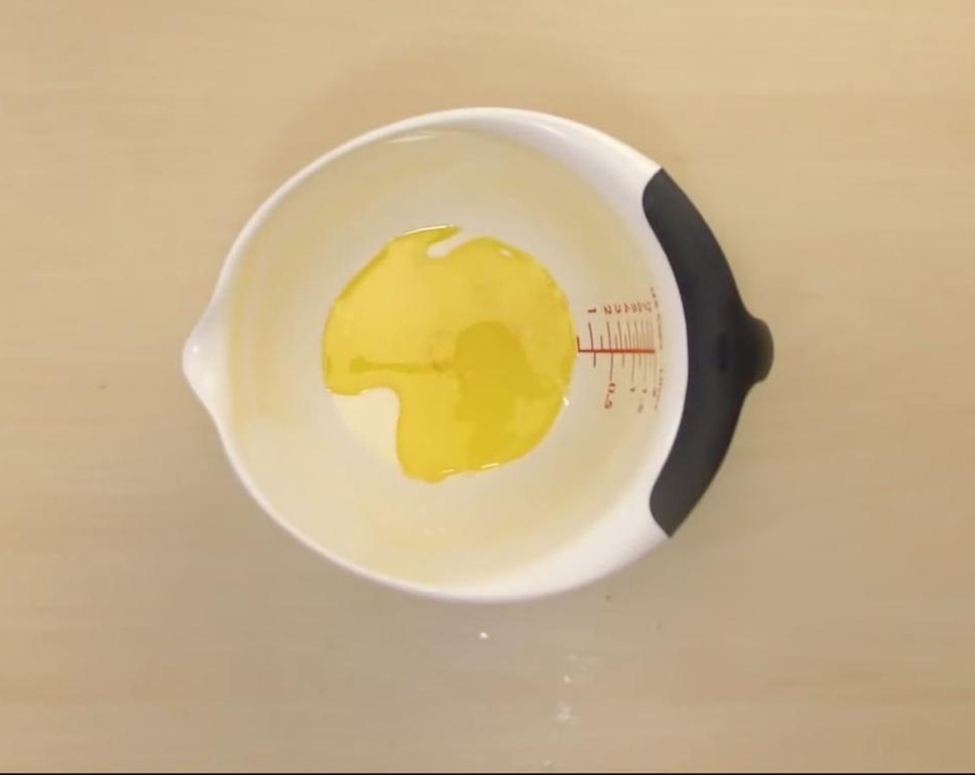 step 4 In a large measuring cup or bowl, combine Butter (3 Tbsp) and Milk (1/4 cup). Mix with a whisk. Then sieve in All-Purpose Flour (3/4 cup). Continue to mix well.