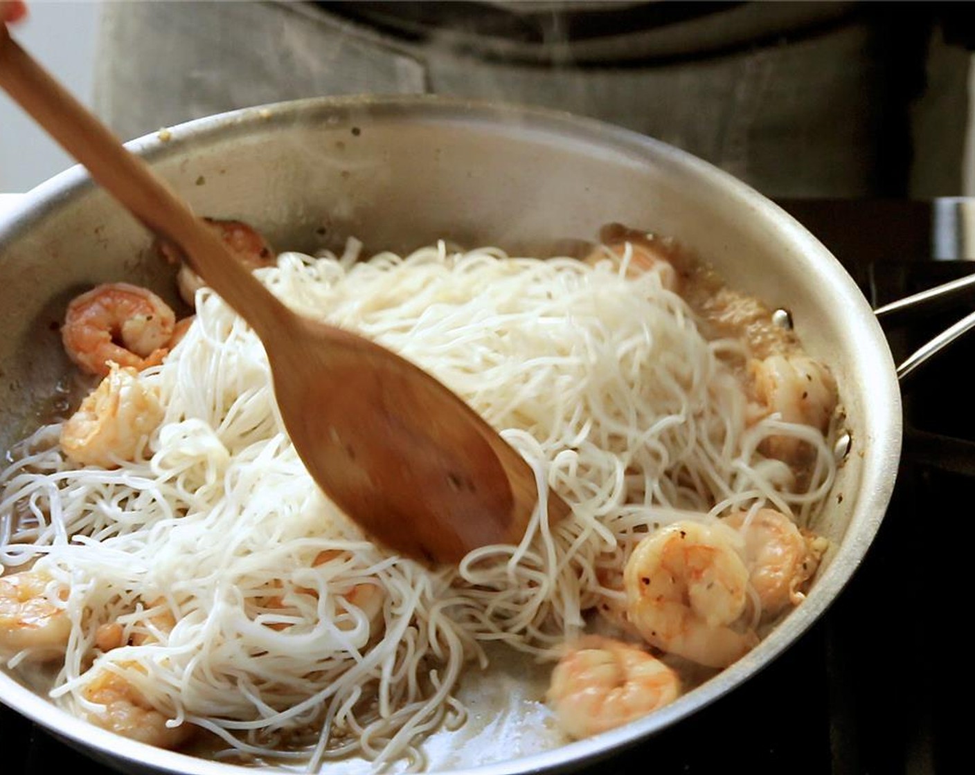 step 7 Add the oyster sauce mixture and the Butter (1/4 cup) to the saute pan with the shrimp and stir until well combined. Add the noodles and mix to combine. Set aside.