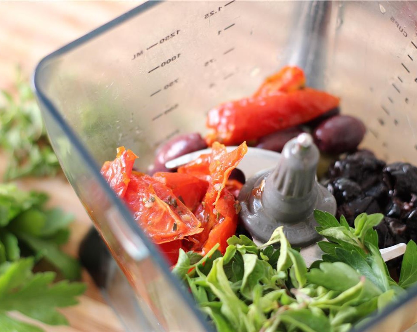 step 1 In a food processor, combine Kalamata Olives (1/2 cup), Green Olives (1/4 cup), Beldi Olives (1/4 cup), Roasted Tomatoes (1/4 cup), Garlic (2 cloves), Fresh Parsley (2 Tbsp), Fresh Oregano (1 Tbsp), 2 Tbsp of juice from Lemon (1) and Olive Oil (2 Tbsp).