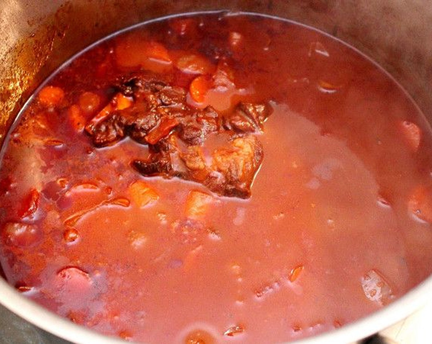 step 3 Return the beef to the pot, season with Kosher Salt (to taste) and Cayenne Pepper (to taste), simmer for about 2-3 hours until meat is very tender, but not falling apart. After 2 hours, adjust seasonings to taste.