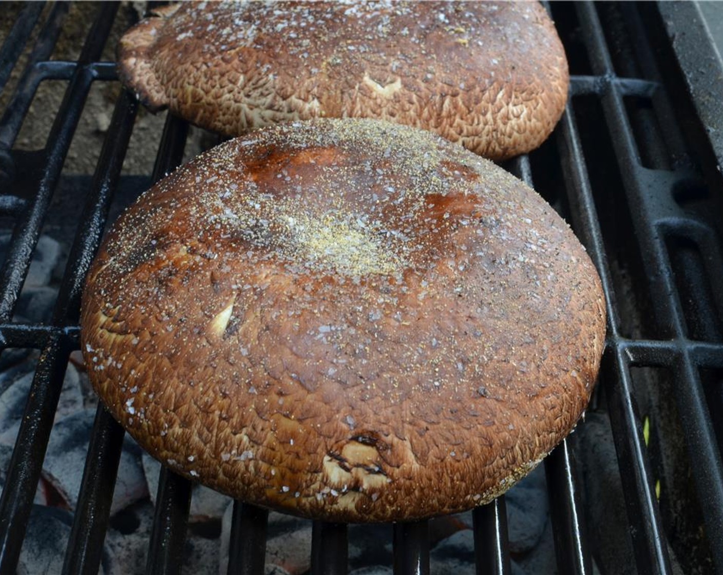 step 5 Once your grill is heated and you're ready to go, cook the mushrooms bowl side (cavity side) down for 7 to 8 minutes.