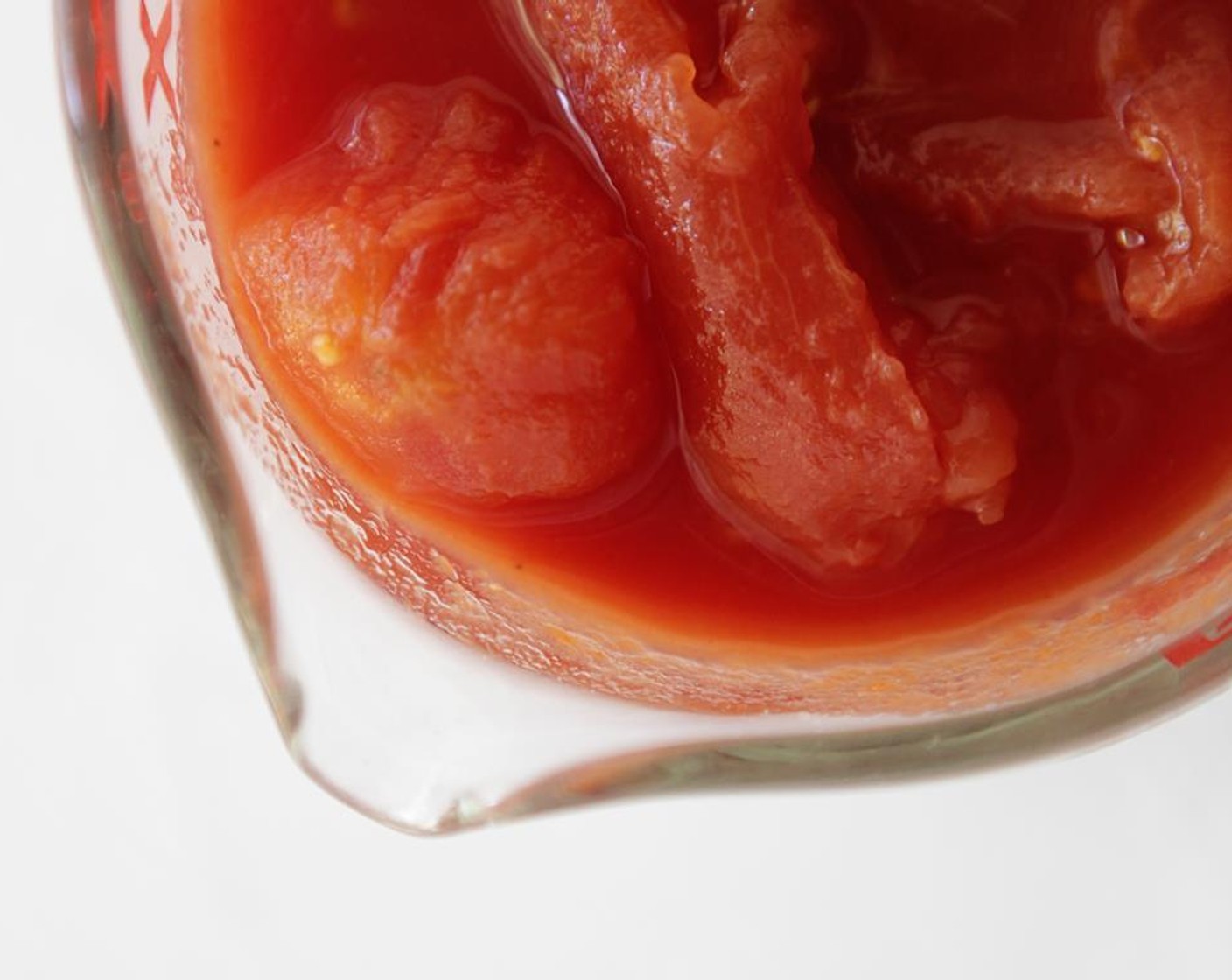 step 4 Add the Canned Diced Tomatoes (2 cups) with the liquid. Reduce heat to medium, and bring to a simmer. Add parsley, oregano and Kosher Salt (1/2 tsp).