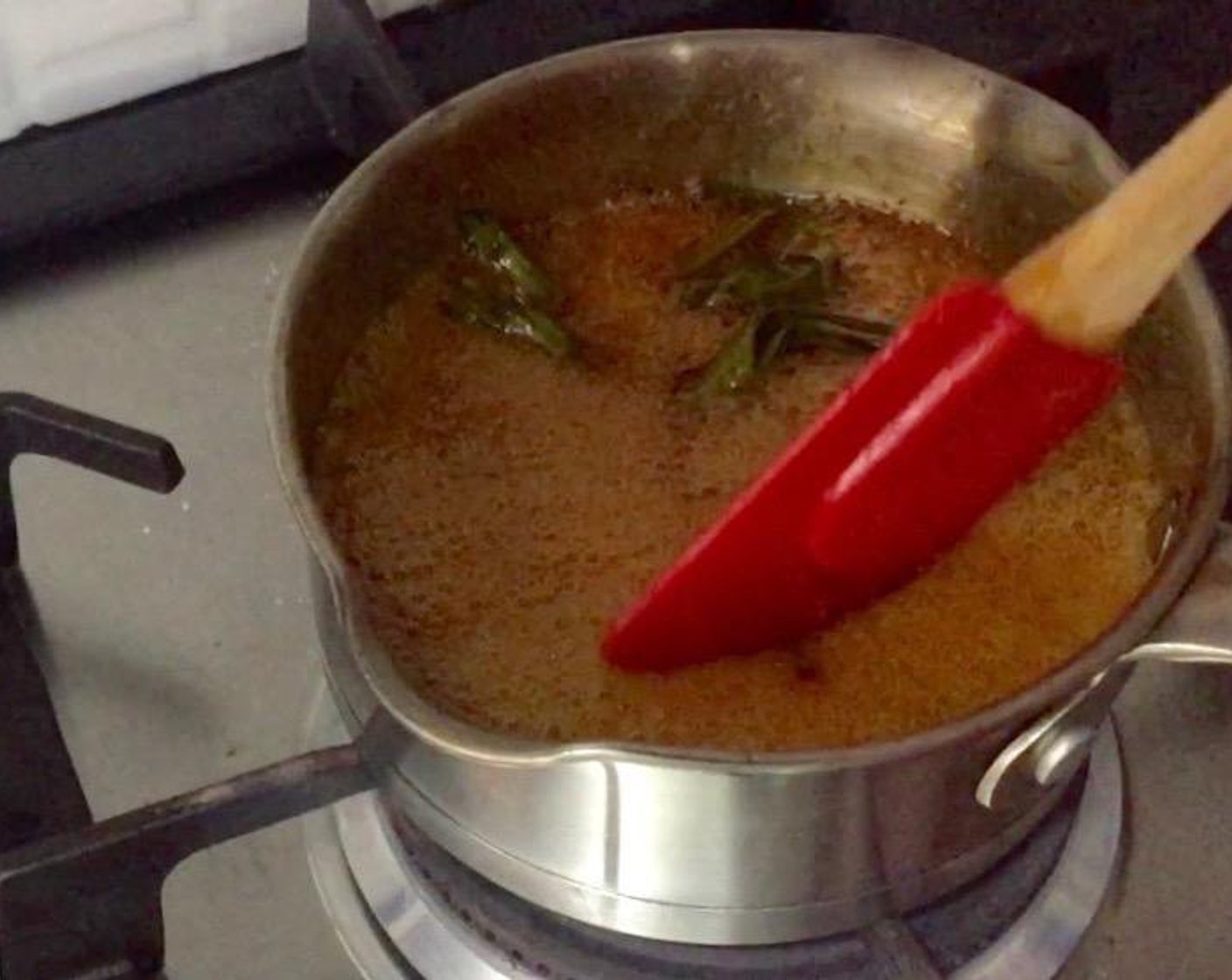 step 6 Bring to a boil till the palm sugar is melted. Stir occasionally.