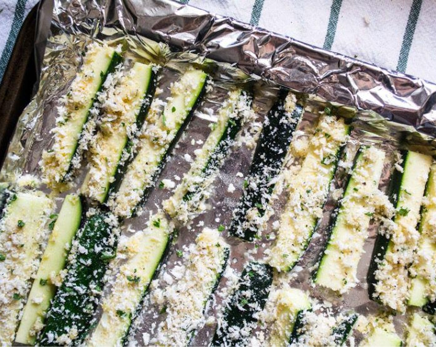 step 6 Remove pan, flip each fry, and bake for an additional 8-10 minutes, or until zucchini is cooked through and breaded outside is crispy and golden brown.
