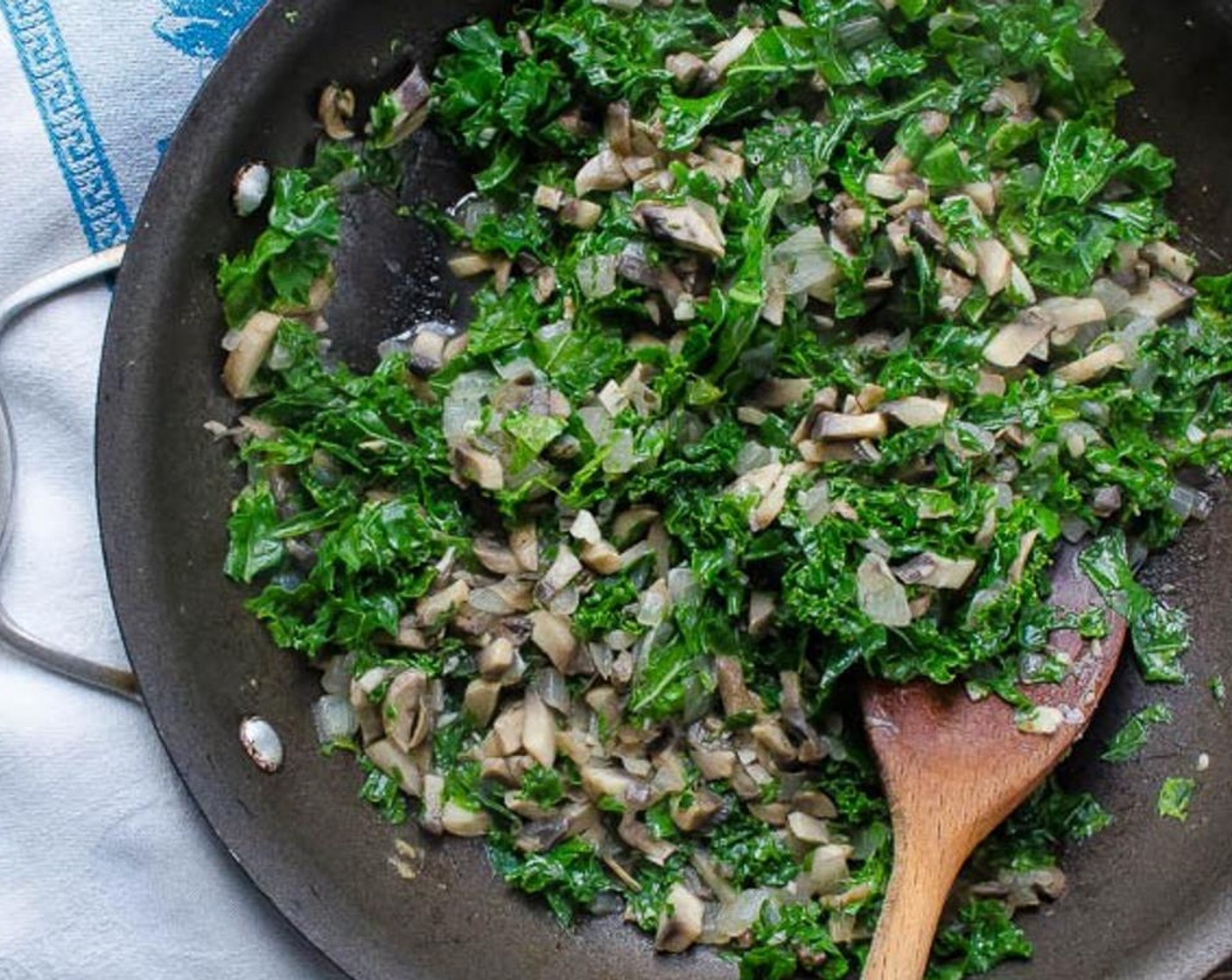 step 7 Stir in the Kale (2 cups) and Vegetable Broth (1/4 cup), cover and reduce heat to a simmer for 3 to 4 minutes until kale softens.