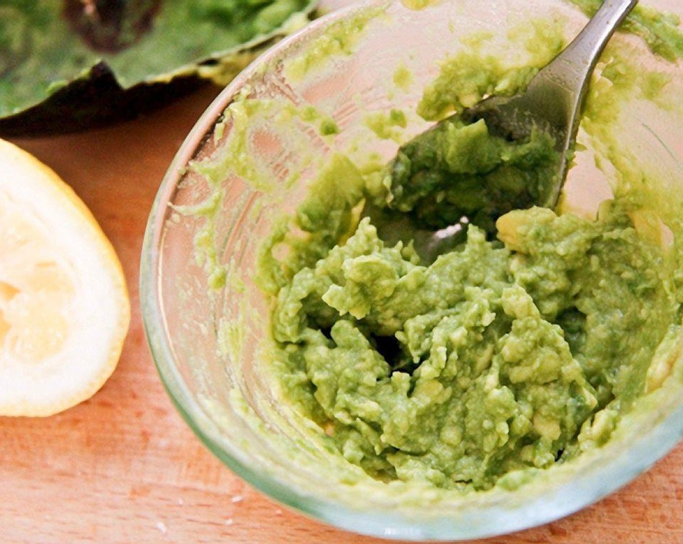 step 5 Mash the avocado then squirt a little bit of lemon to keep the green looking vibrant.