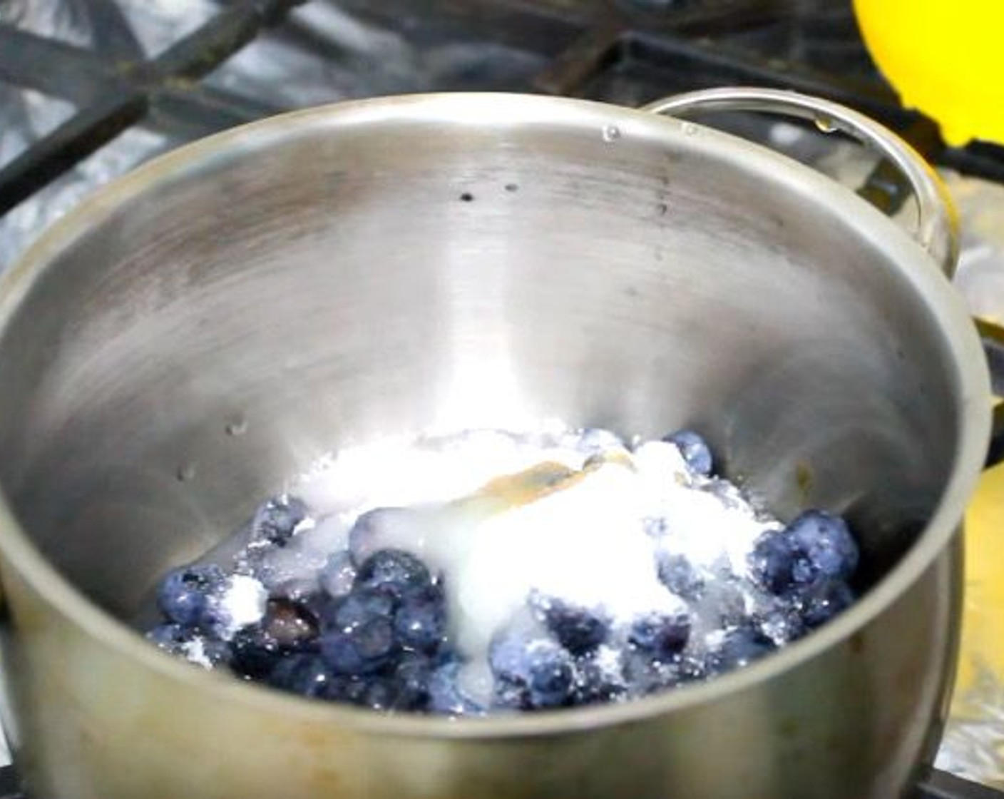 step 11 In a saucepan, add Fresh Blueberries (2 cups), Granulated Sugar (1/3 cup), Vanilla Extract (1/4 tsp), Water (1/4 cup), and juice from Lemon (1). Bring mixture to a boil. Reduce heat to low and cook for 15 minutes.