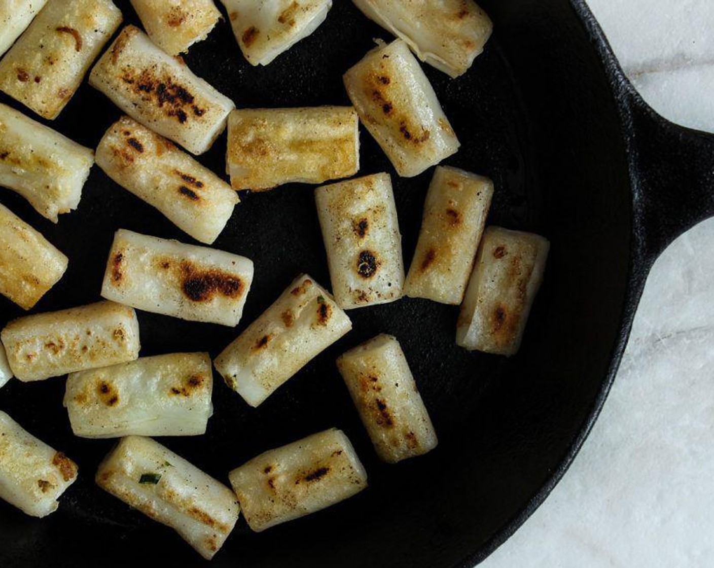 step 6 When the pan is hot, add the rolls and toast them in a single layer so they don’t stick and clump together.