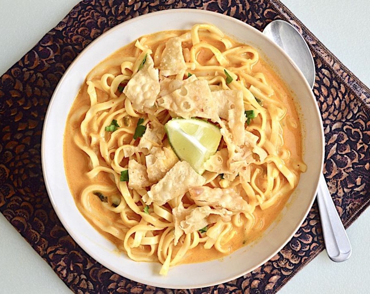 step 6 Ladle into bowls and top with Limes (to taste) and Crunchy Rice Noodles (to taste). Enjoy!