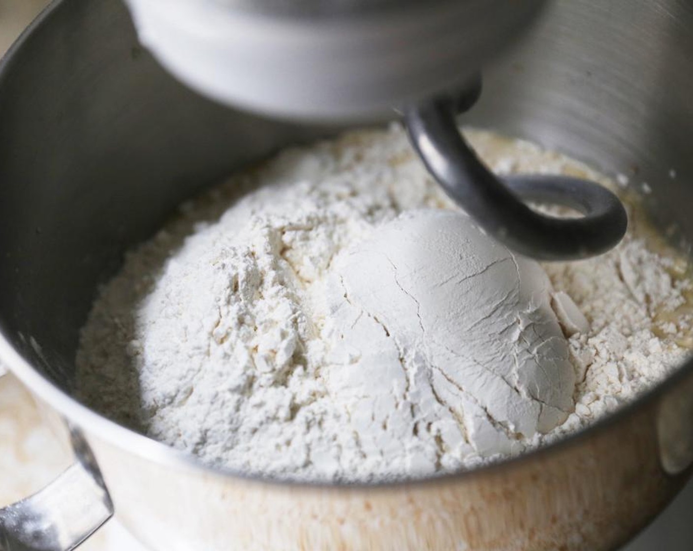 step 5 Add the All-Purpose Flour (5 cups) and mix on a low speed until the dough just comes together.