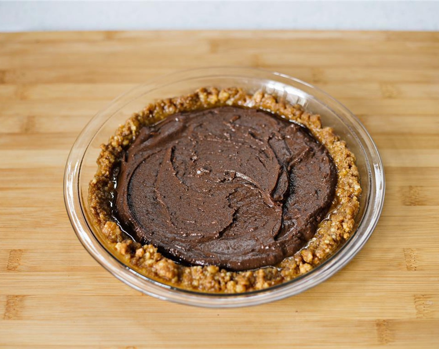 step 12 Pour into prepared crust, and use a spatula to smooth into an even layer.