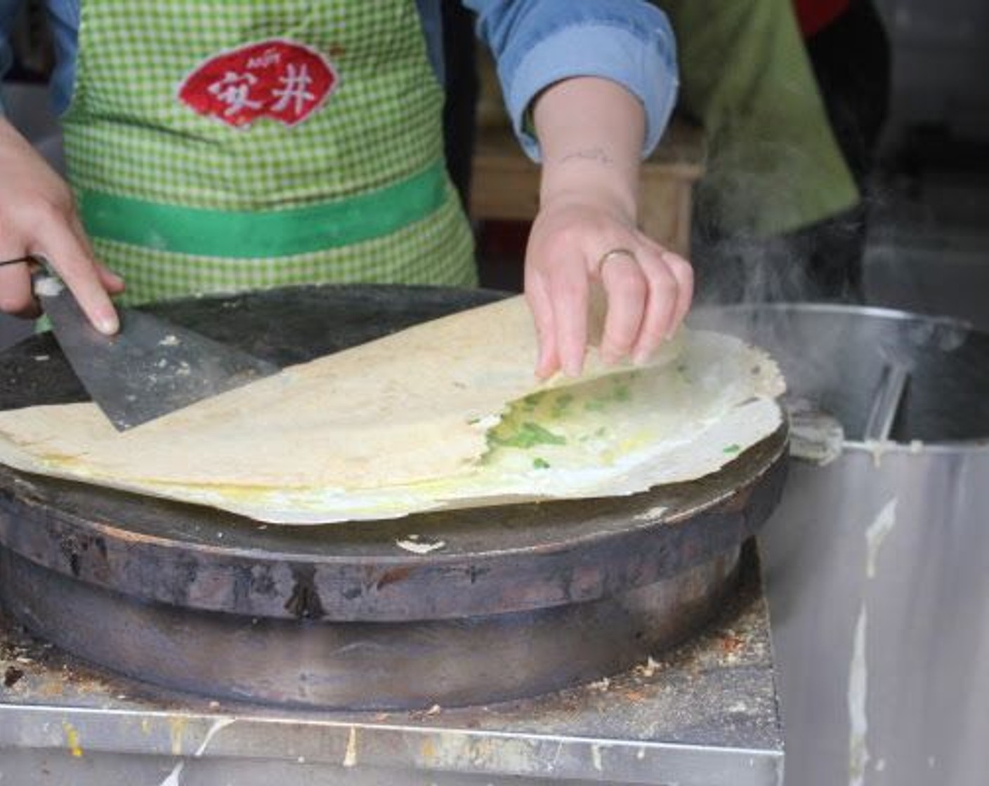 step 7 Once the dough fully sets, fold the crepe in half.