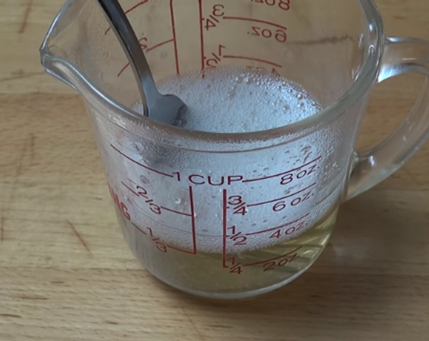 step 3 In a heat-proof cup containing Water (1/4 cup), add the Gelatin Powder (1 Tbsp). Using a fork, mix together until the gelatine is completely dissolved. Set aside to cool.