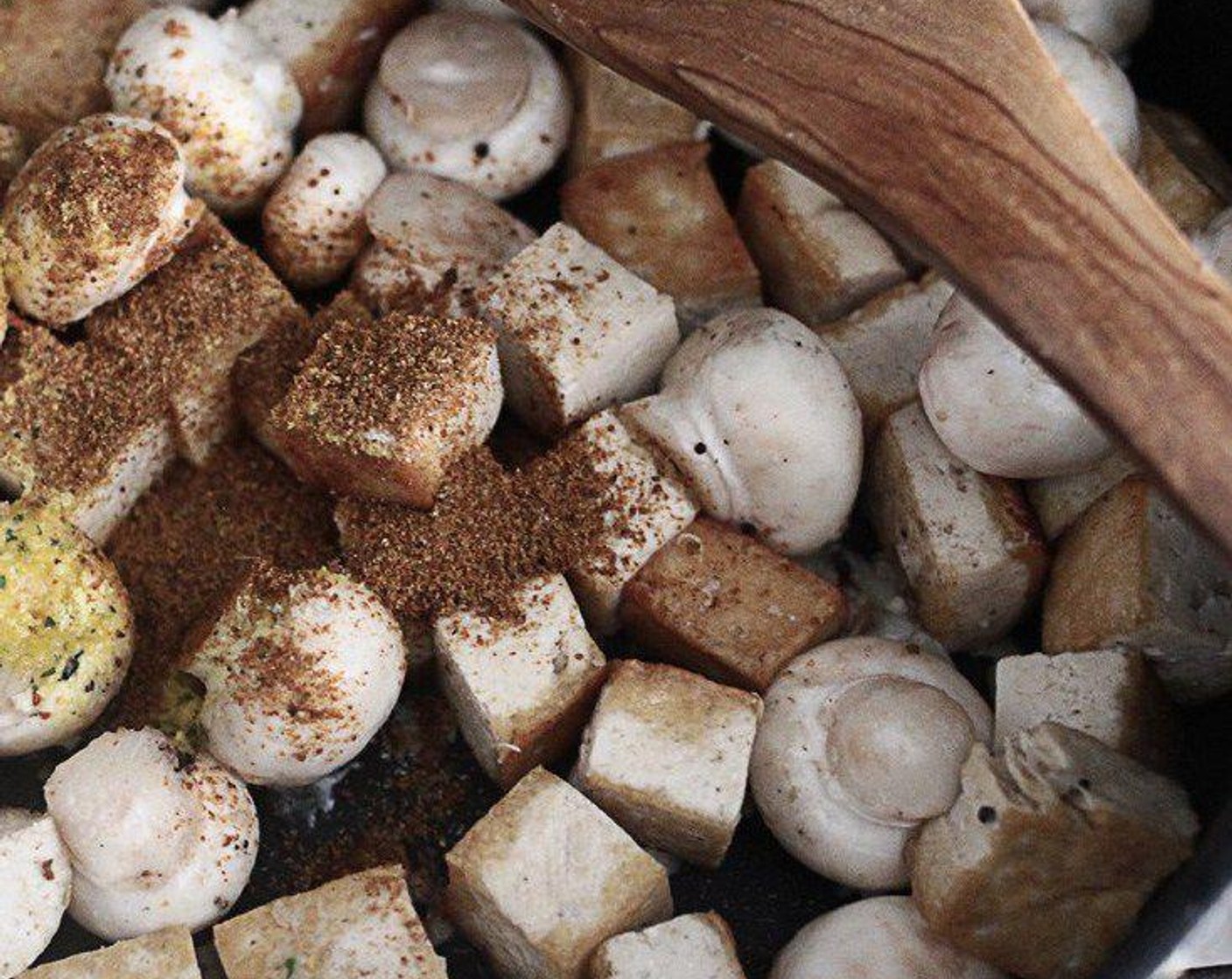 step 2 Add in Button Mushrooms (1 1/2 cups), Garlic (2 cloves), Vegetable Bouillon Cube (1 tsp), Jerk Seasoning (1/2 Tbsp), and Salt (1/2 tsp), stir-fry them gently for another 5 minutes, set aside. And allow to cool for 5 minutes.