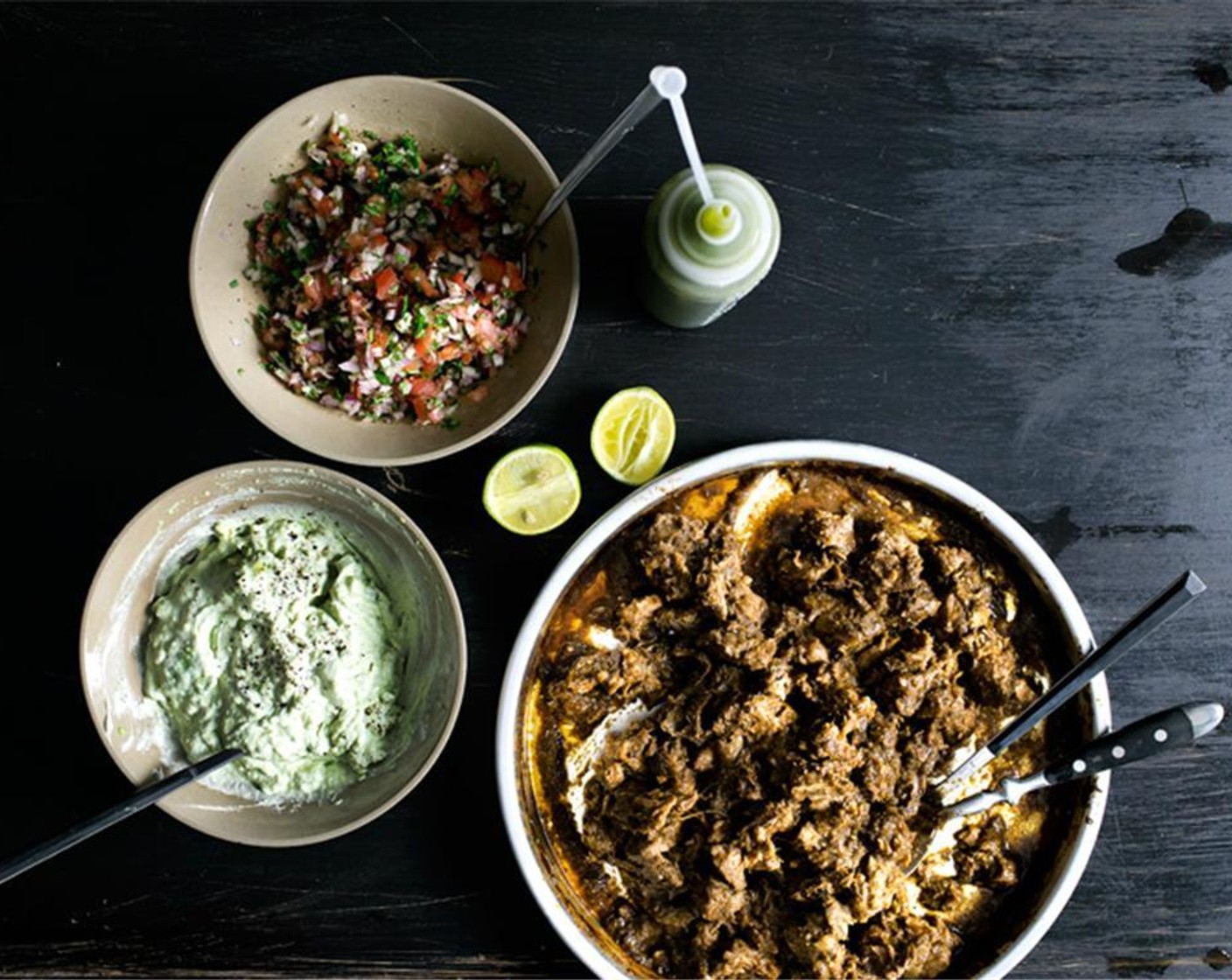 step 10 Before serving, mash the Avocados (2) and mix with an equal amount of Sour Cream (to taste), Lime (1/3) and Freshly Ground Black Pepper (1/4 tsp) together until slightly chunky. Set aside.