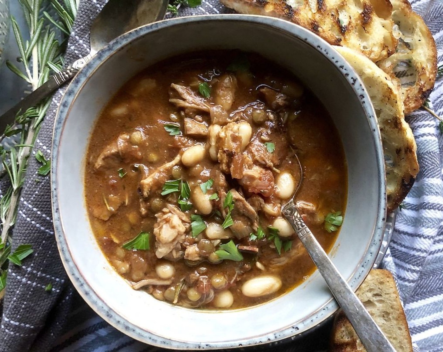 step 5 Gently fold in the Canned White Beans (1 can) and cook until heated through, about 3 minutes. Garnish with Fresh Parsley (to taste) and serve with crusty bread, if desired.