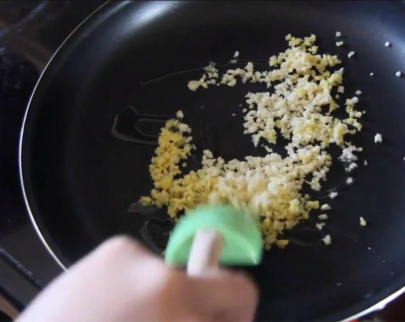 step 8 Sauté about half of the garlic and the ginger until softened, but not browned.