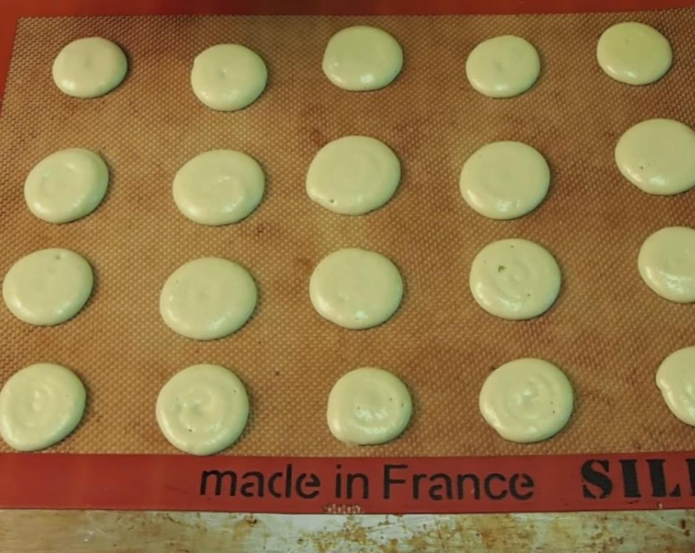 step 7 Rap the cookie sheet firmly onto your counter a couple times to release any trapped air bubbles and allow the trays to sit out for 15-20 minutes to develop a "shell."