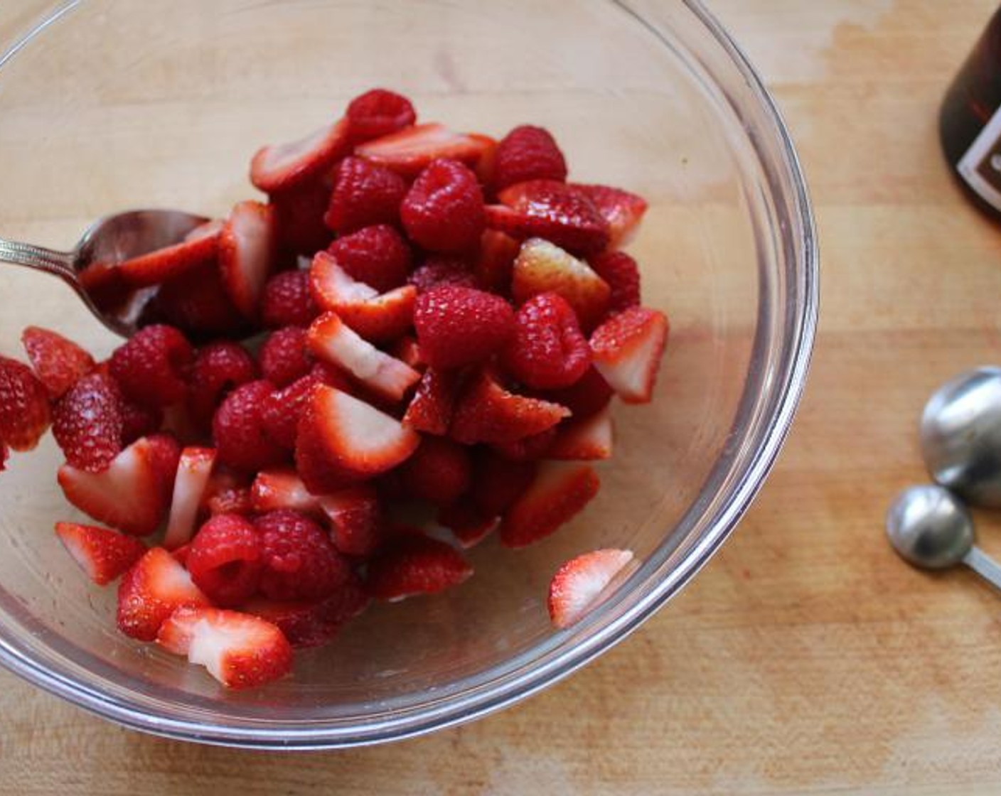 step 4 Meanwhile, in a medium bowl, toss the Fresh Raspberry (1 cup) and Fresh Strawberry (1 cup) with the remaining Grand Marnier (2 Tbsp).