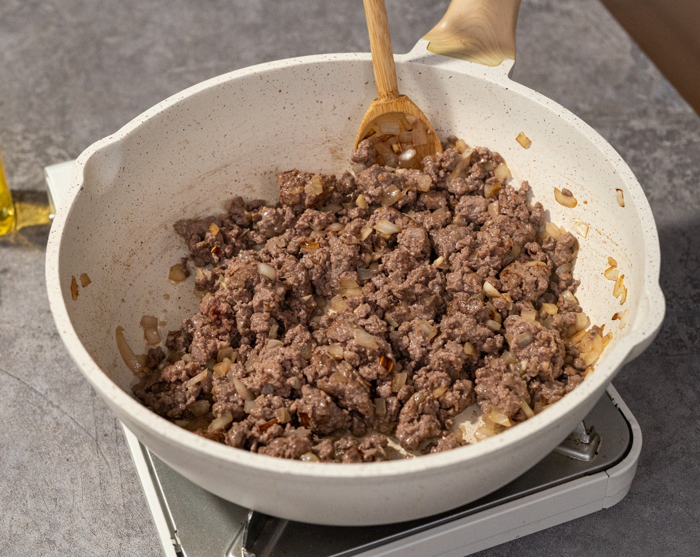step 4 Add Ground Beef (1 lb) and use a spatula to break it down. Cook until no longer pink for about 3 minutes.