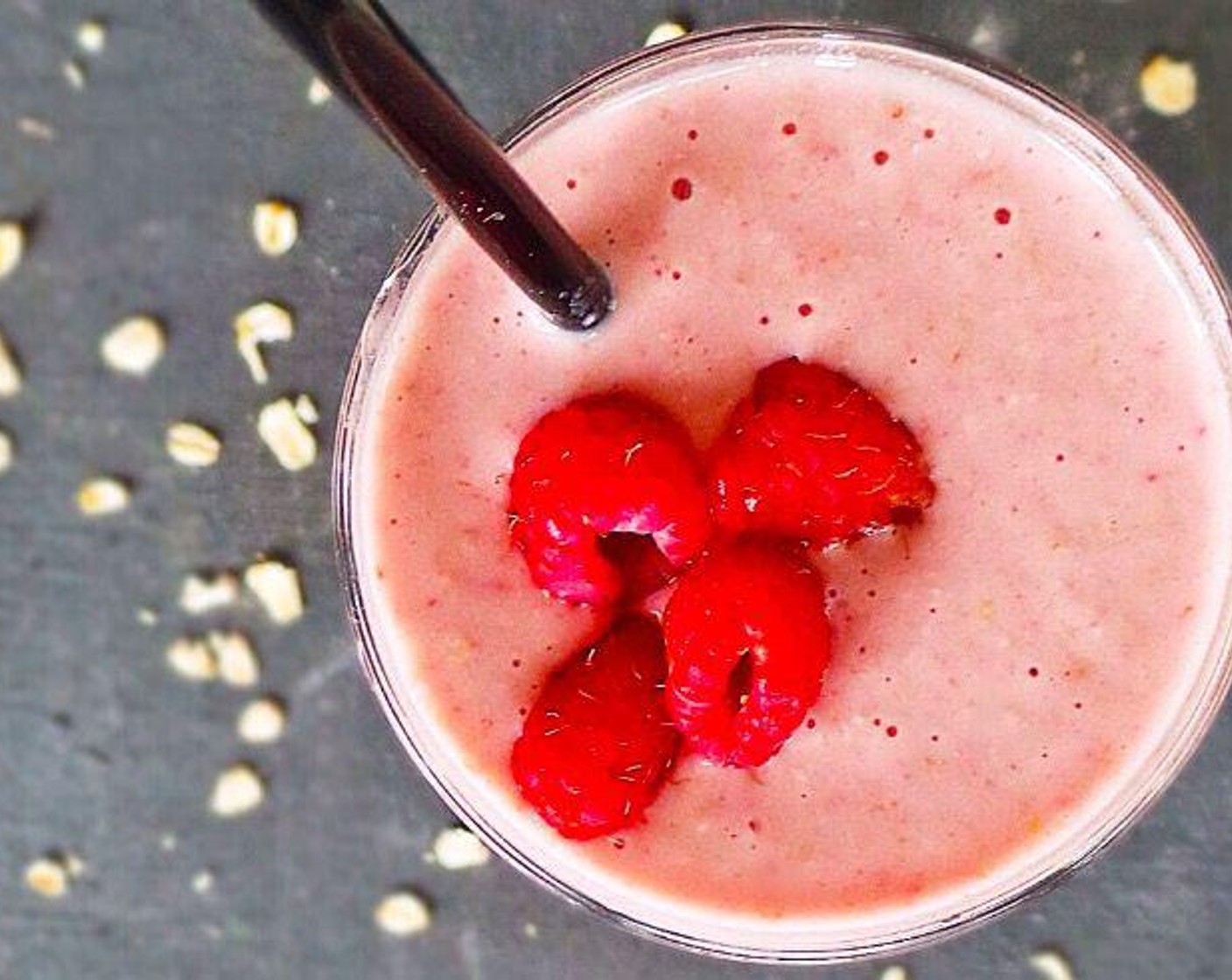 step 1 Place Frozen Strawberries (5), Banana (1/2), Nonfat Plain Greek Yogurt (1/2 cup), Old Fashioned Rolled Oats (1/2 cup), and Honey (to taste) in a blender, and blend. Pour the Coconut Water (to taste) in the spout to thin as desired. Serve and enjoy!