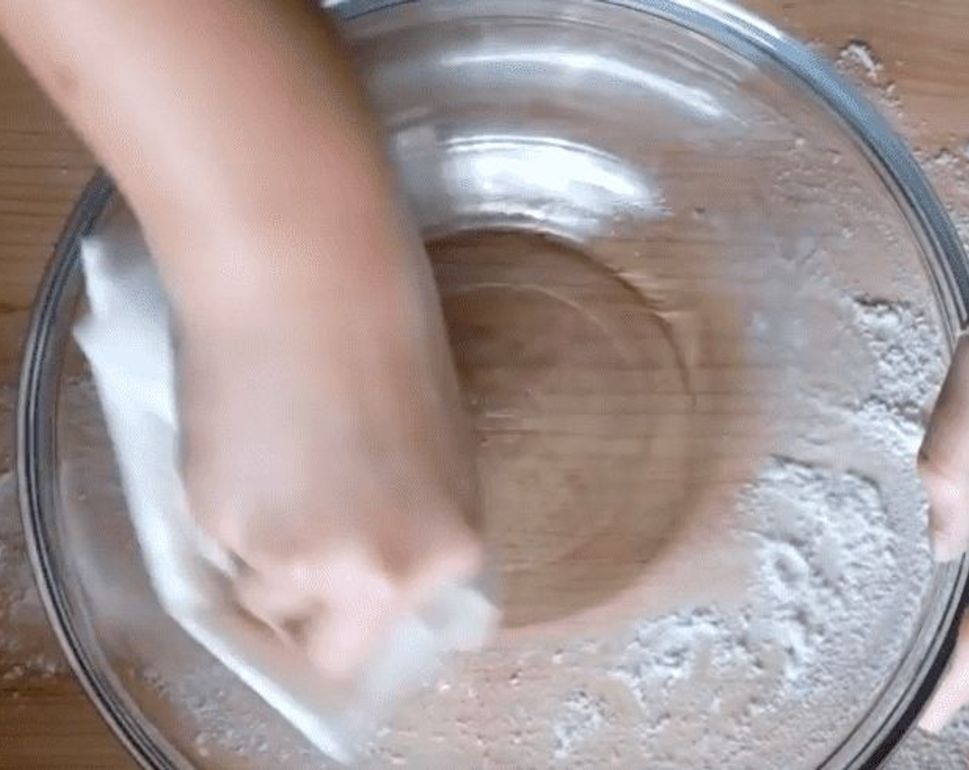 step 4 Add Peanut Oil (1 tsp) to a clean bowl and wipe with paper towel to coat the bowl with oil. Place the dough in the bowl and cover with plastic wrap or a damp towel. Let the dough rest for 20 to 30 minutes.